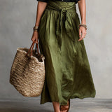 Vera – Two-piece set: black top and olive green midi skirt