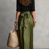 Vera – Two-piece set: black top and olive green midi skirt